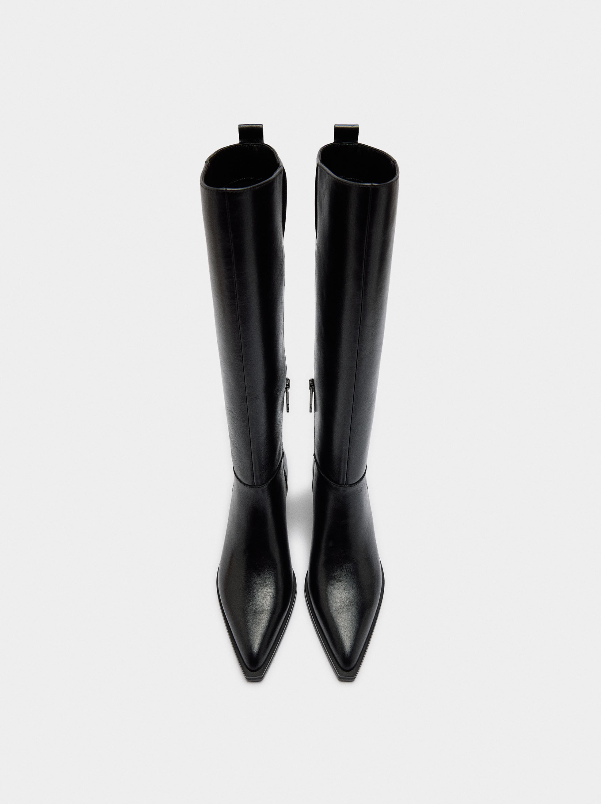High-top leather boots with heels