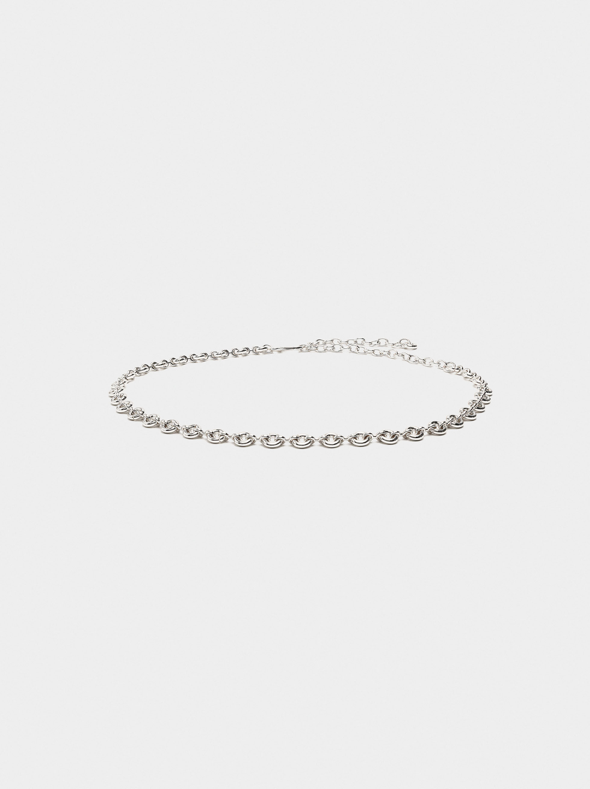 Metal belt with rings