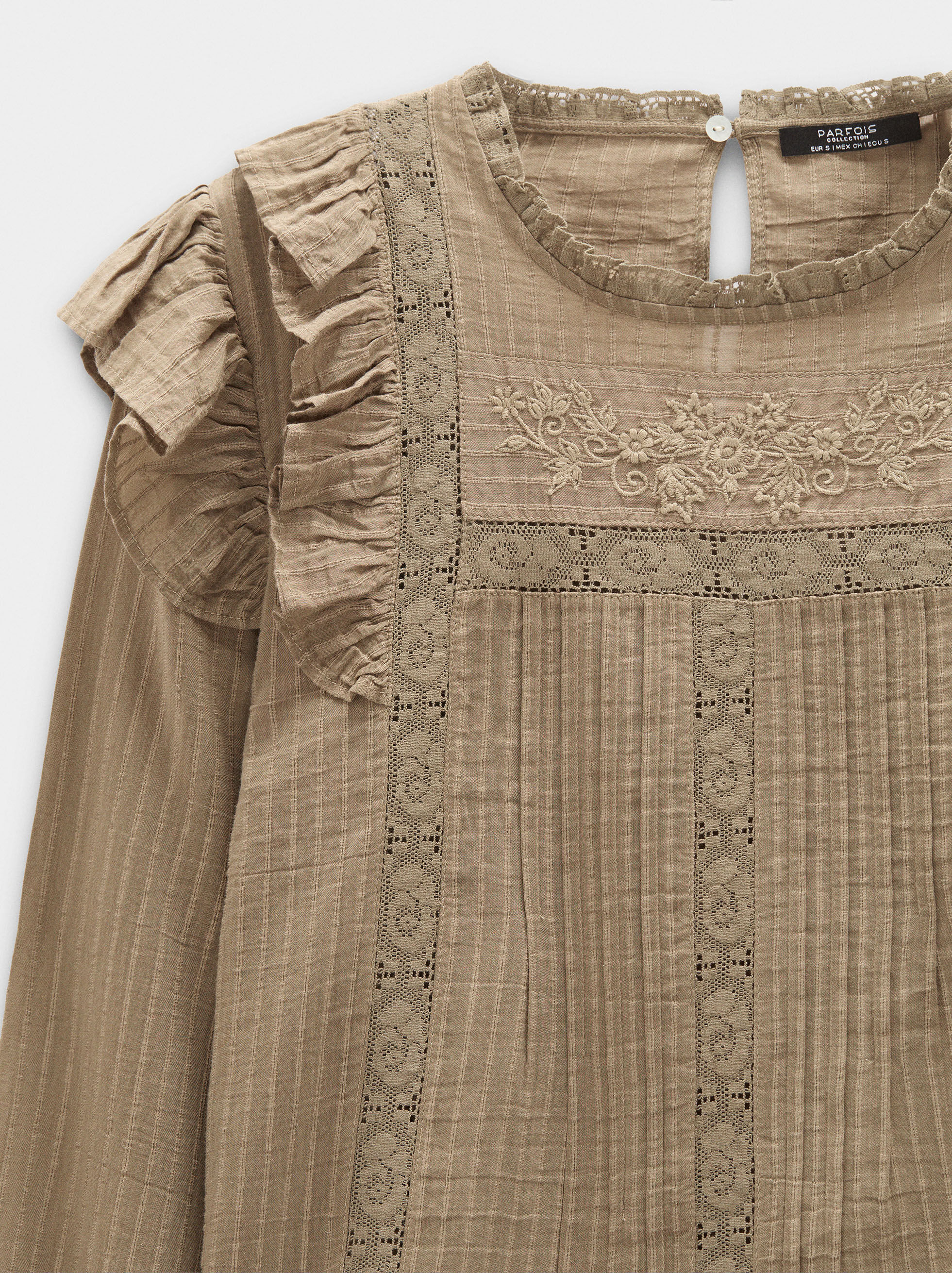 Embroidered and ruffled blouse
